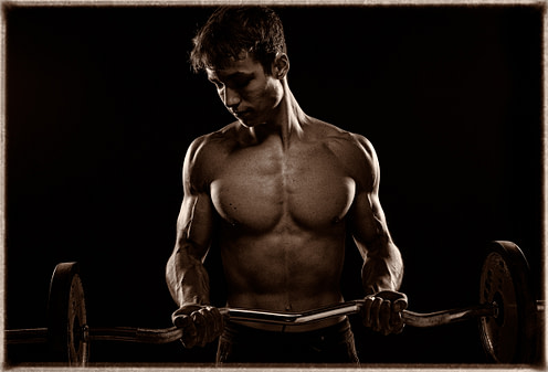 Fotografo fitness Retrato artístico de fotografía fitness en estudio, iluminación dramática con barra de pesas